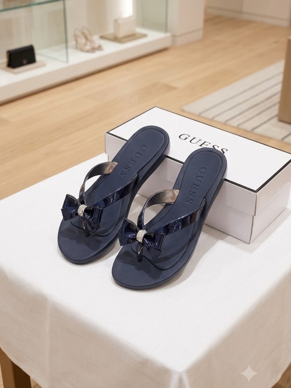 GUESS Navy Bow Flip-Flop Sandals with Crystal Accent